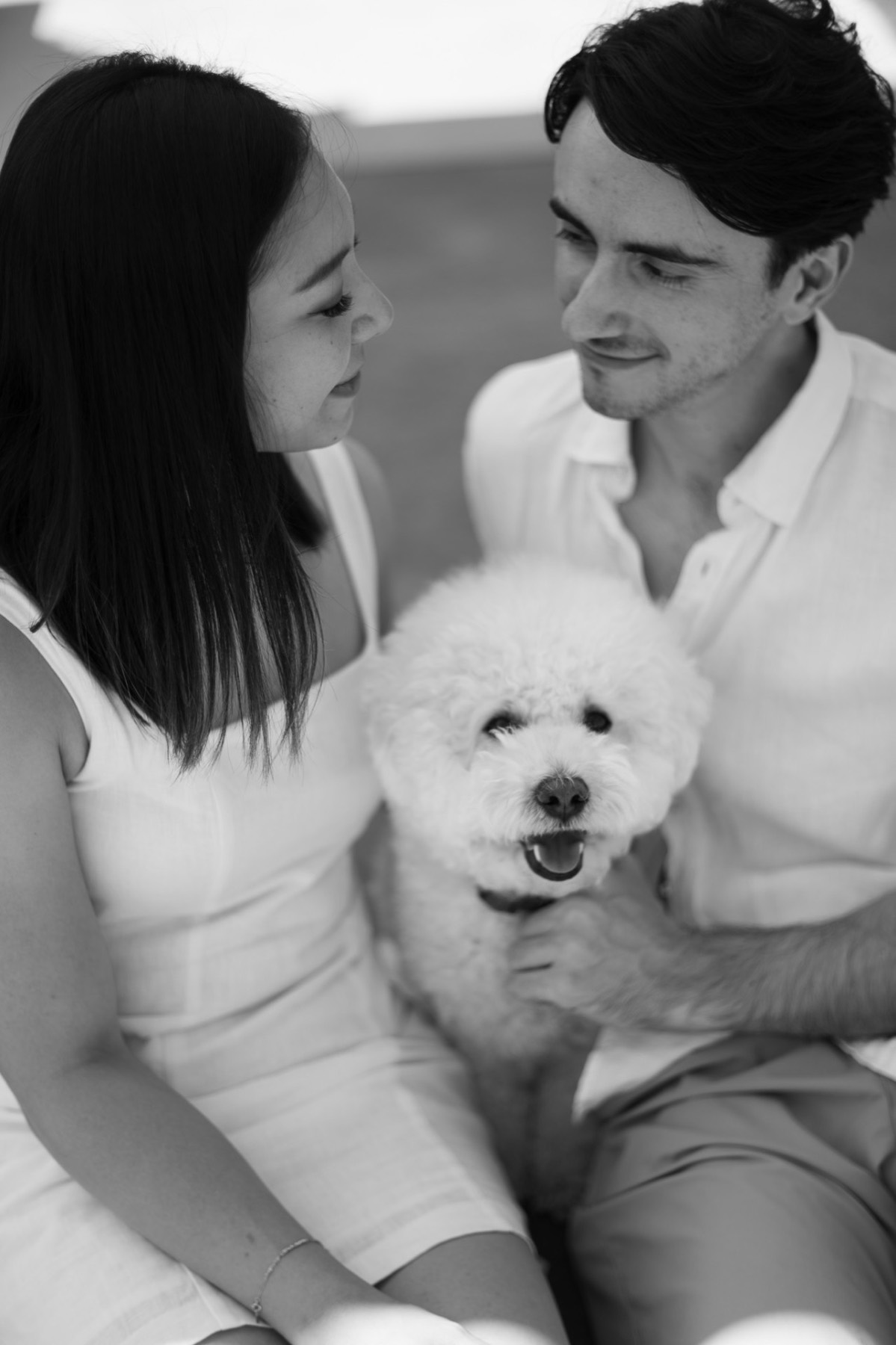 Black and white close-up of the couple gazing at each other over Marlo